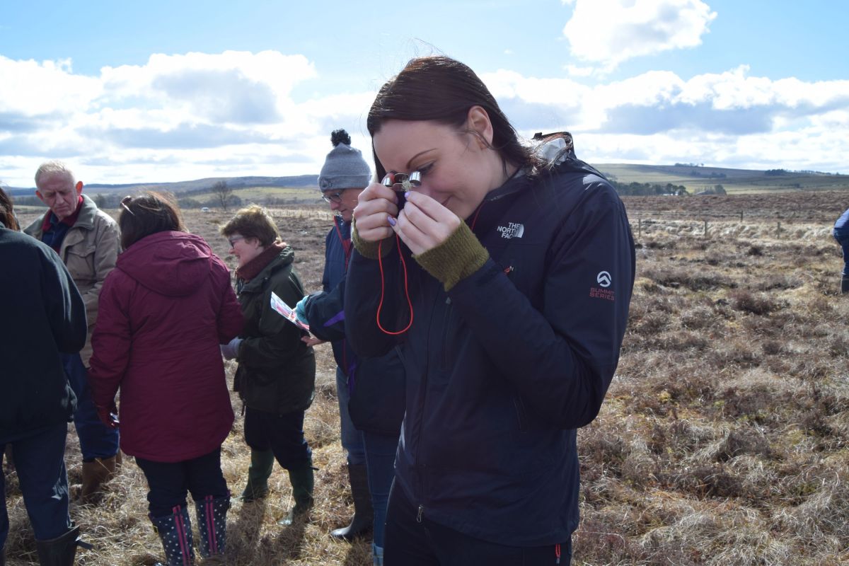 Depute Provost Claire Leitch examines a lichen (c) East Ayrshire Council