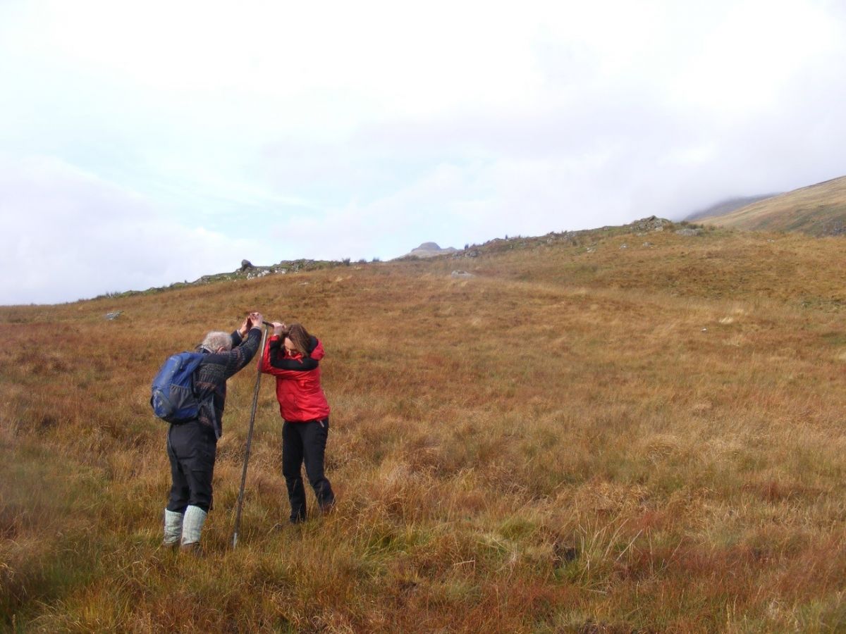 Taking a peat core - Credit Alasdair Eckersall