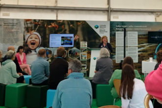Mannon Lewis, who heads the upscaling of National Peatland Action Programme of Wales, presenting a forward look on peatland restoration in Wales and inviting responses.