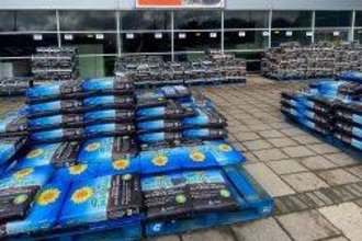 Bags of peat compost on the forecourt of a B&Q store
