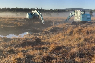 Diggers carrying out restoration work