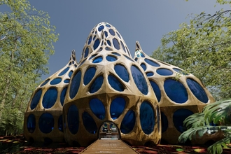 Exterior view of Virtual Peatlands Pavilion showing four large domes in a peat swamp forest