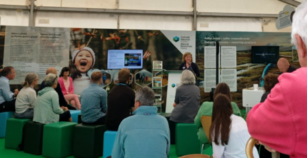 Mannon Lewis, who heads the upscaling of National Peatland Action Programme of Wales, presenting a forward look on peatland restoration in Wales and inviting responses.