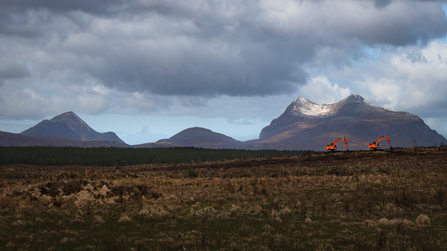 Two diggers on  Cul Mor mountain