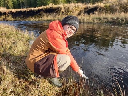 Researcher Liam Goodwin in the field