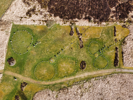 Aerial view of stone circles on a peatland site.