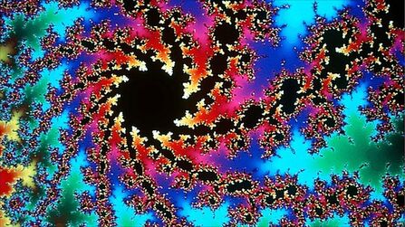 Brightly coloured image of a comet-like swirl.